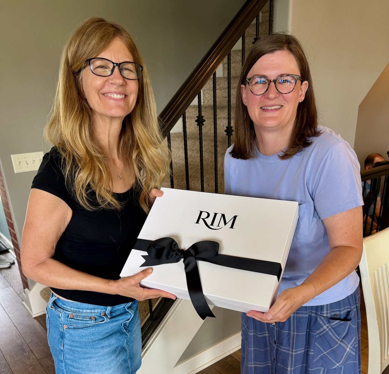 Kelly presenting RIM product to friend Ann